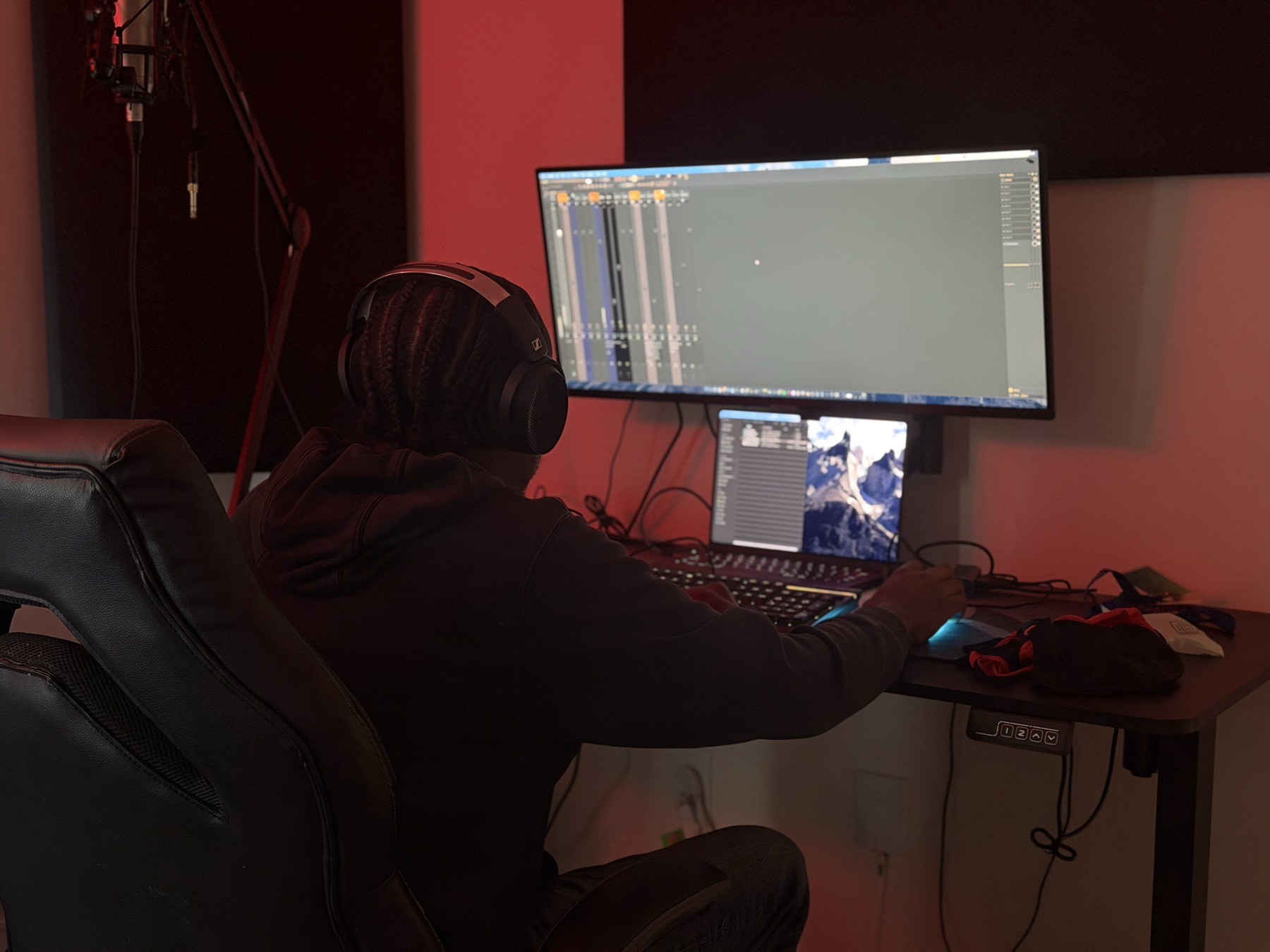 Session in progress at the studio workstation under red lighting